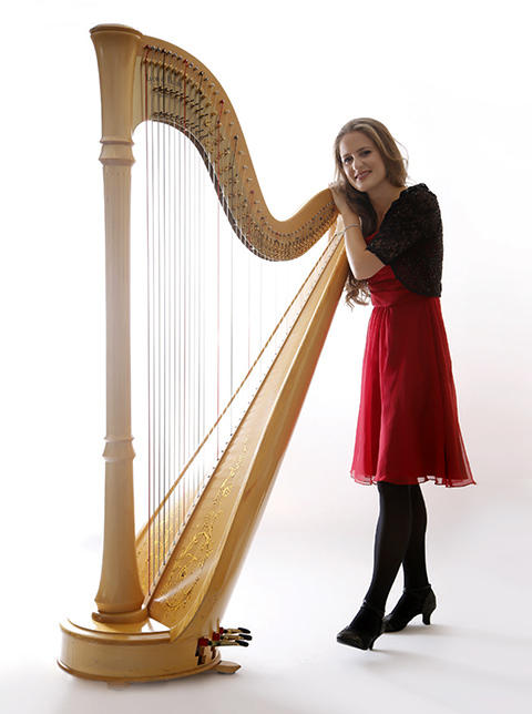 This is a picture of the Harpist from the European Chamber Ensemble